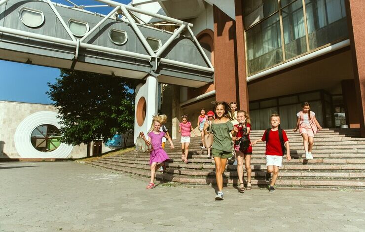 happy kids playing city s street sunny summer s day front modern building group happy childrens teenagers having fun together concept friendship childhood summer holidays 155003 18278 1 WingsMyPost