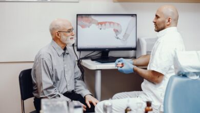 a man getting denture treatment