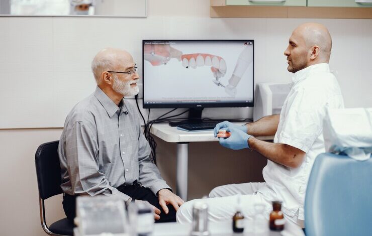 a man getting denture treatment