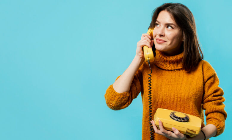 a girl calling on a telephone