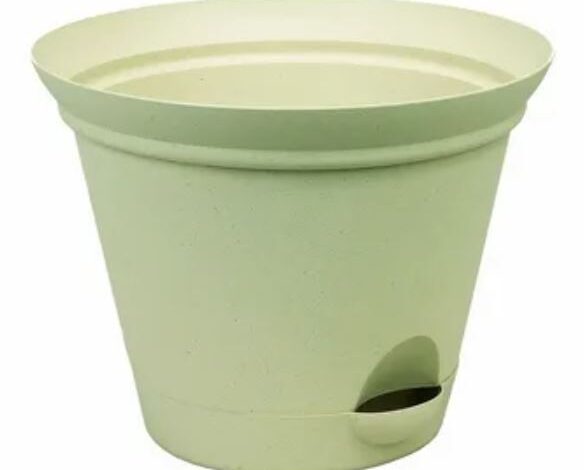 A green plastic planter featuring a secure lid, ideal for indoor or outdoor gardening.